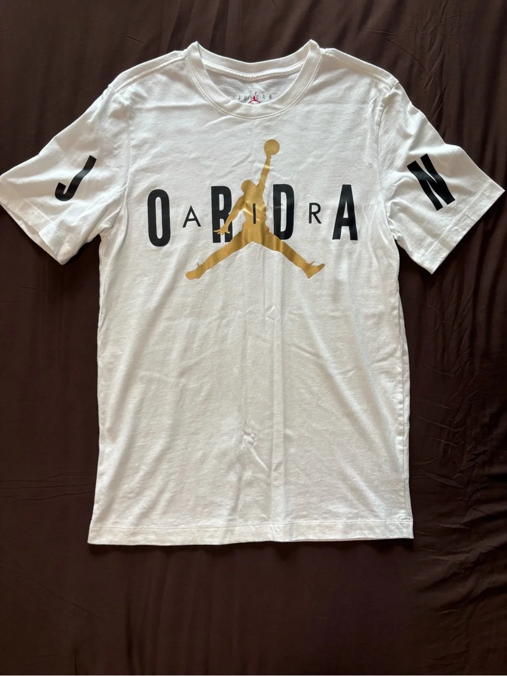 Jordan White Short-Sleeve Tee with Gold Jumpman and Black Lettering